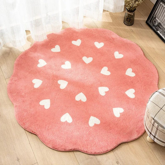 Tapis rond rose doux