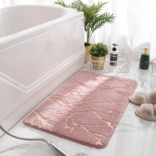 Tapis de bain rose et doré